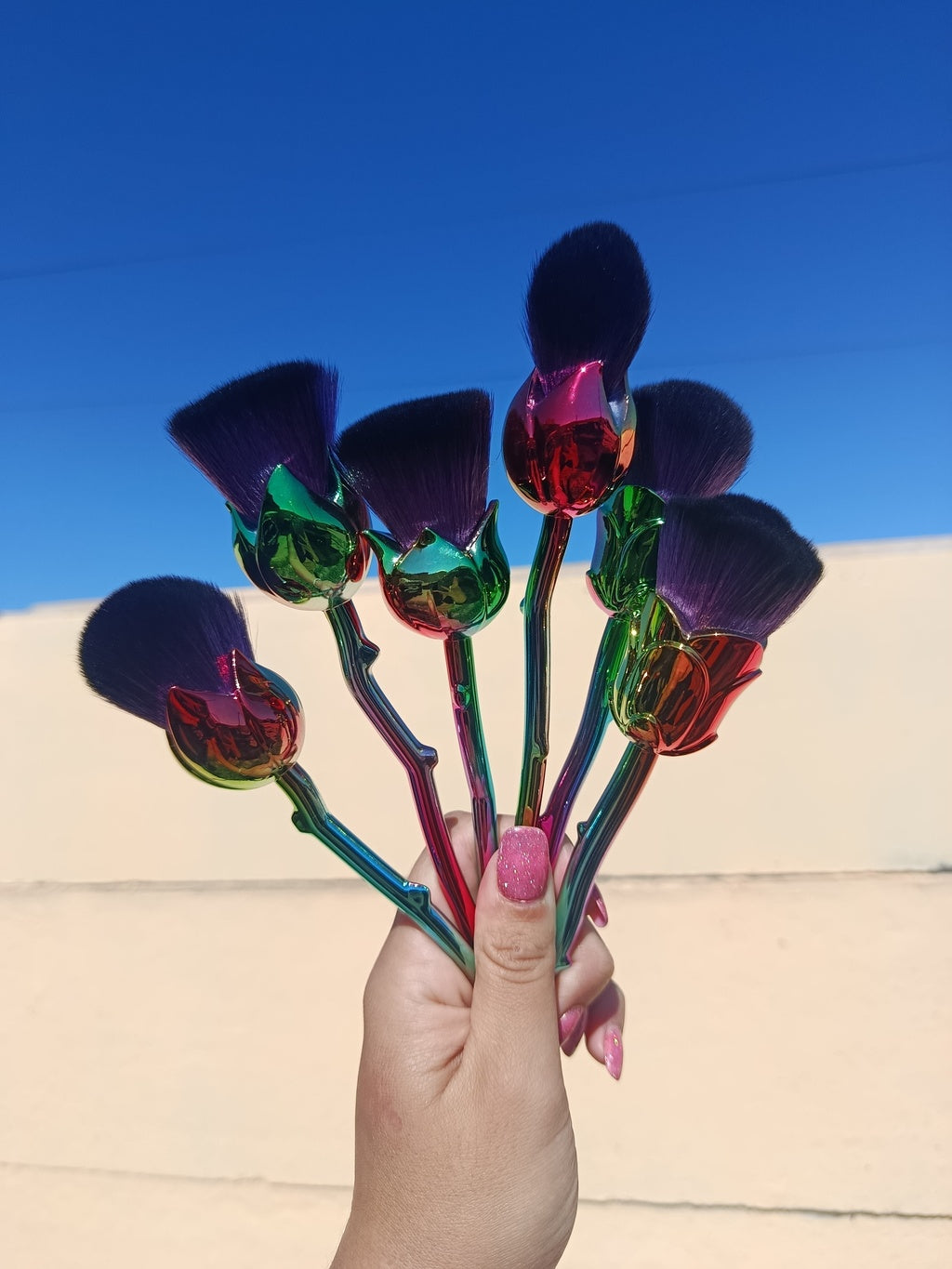 Brocha para retirar polvo con forma de rosa