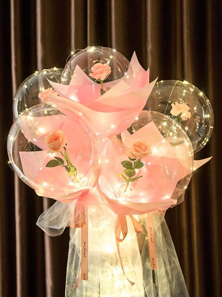 Flor en globo con luces