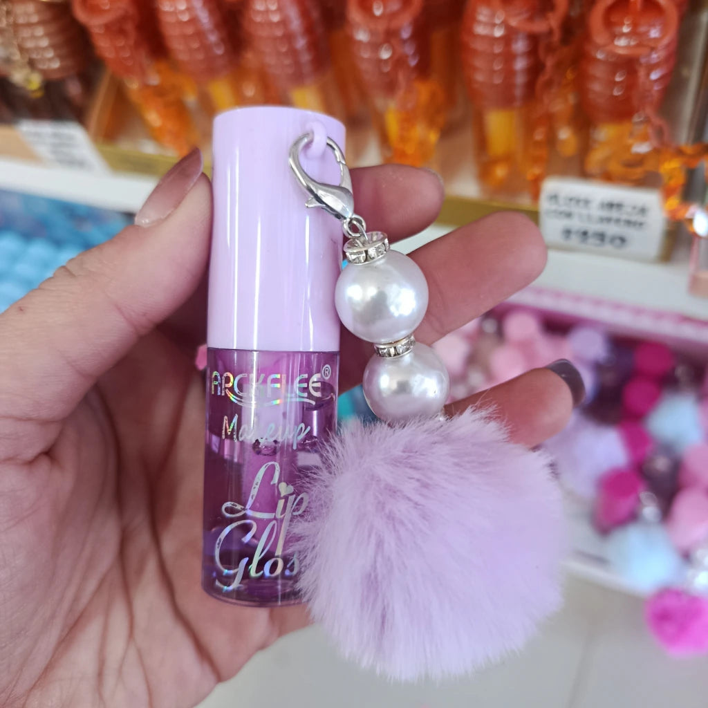 Gloss Lip Oil con llavero de perlas y pom pom